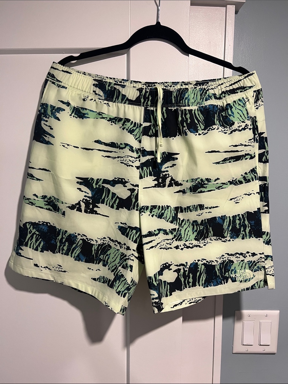 The North Face Pale Yellow Swim Trunks with Black and Teal Brush Print